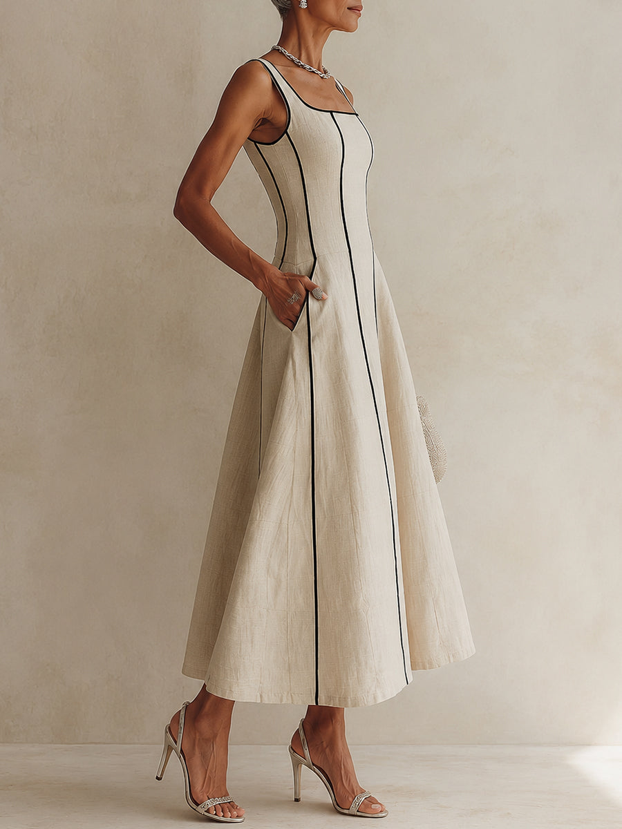 Vestido largo de algodón y lino a rayas con ribete negro
