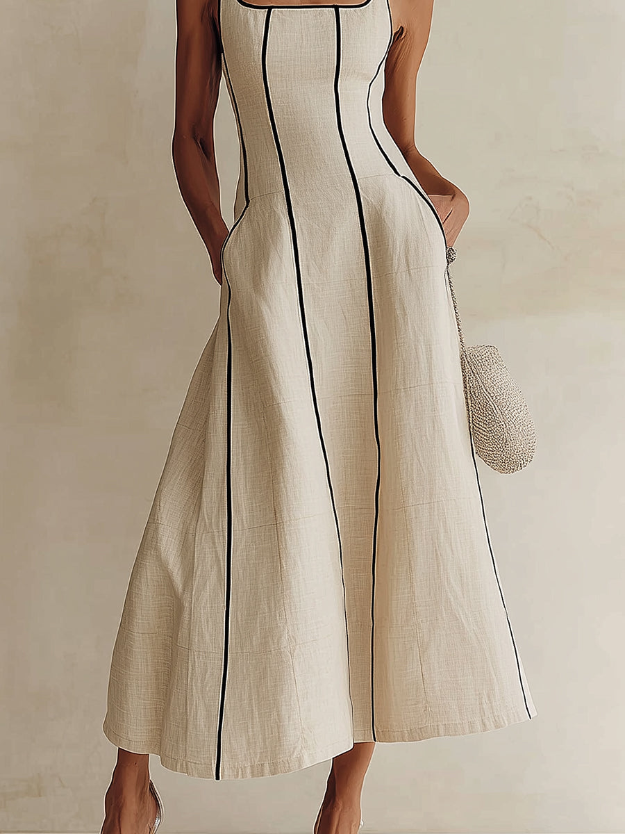 Vestido largo de algodón y lino a rayas con ribete negro