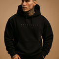 Sudadera oversize de algodón con capucha y bolsillo canguro.